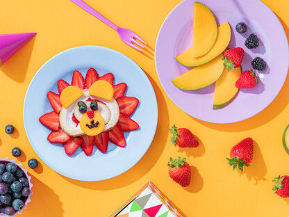 Erdbeerkuchen mit Löwengesicht für Kinder